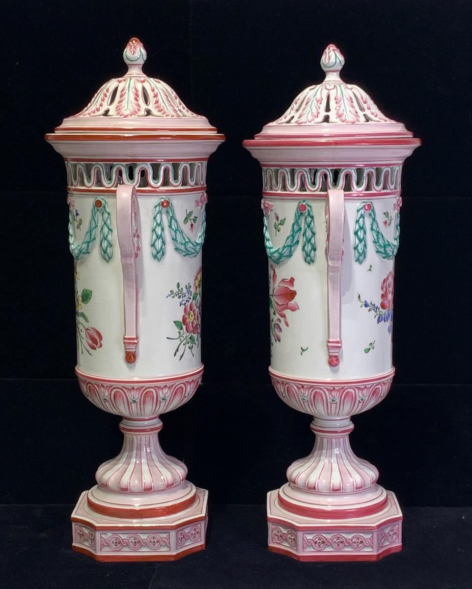 Early 20th Century French Faience Neoclassic Pink and White Lidded Porcelain Urns by K. G. Luneville - a Pair