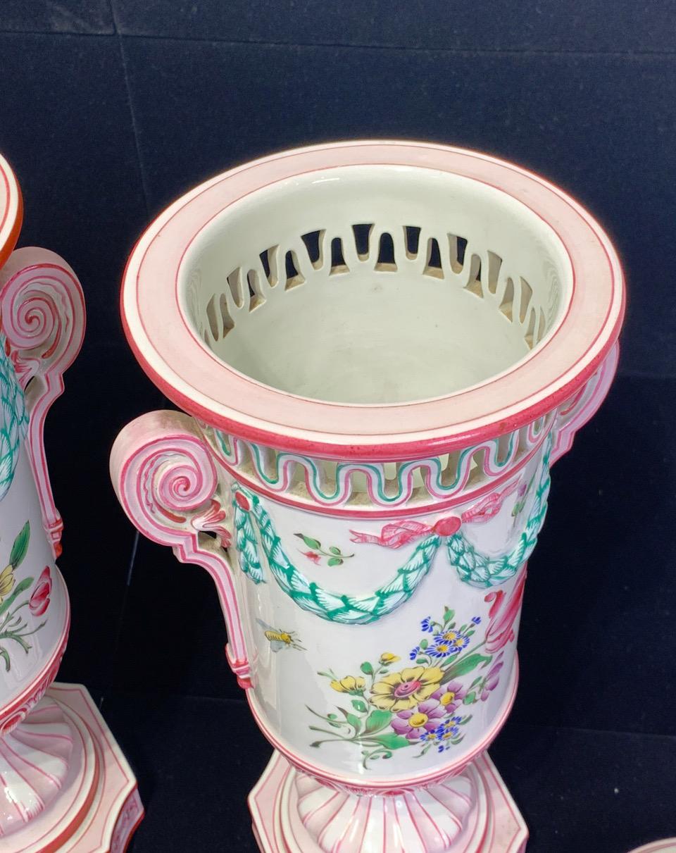 Early 20th Century French Faience Neoclassic Pink and White Lidded Porcelain Urns by K. G. Luneville - a Pair