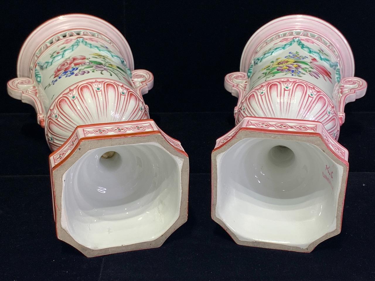 Early 20th Century French Faience Neoclassic Pink and White Lidded Porcelain Urns by K. G. Luneville - a Pair