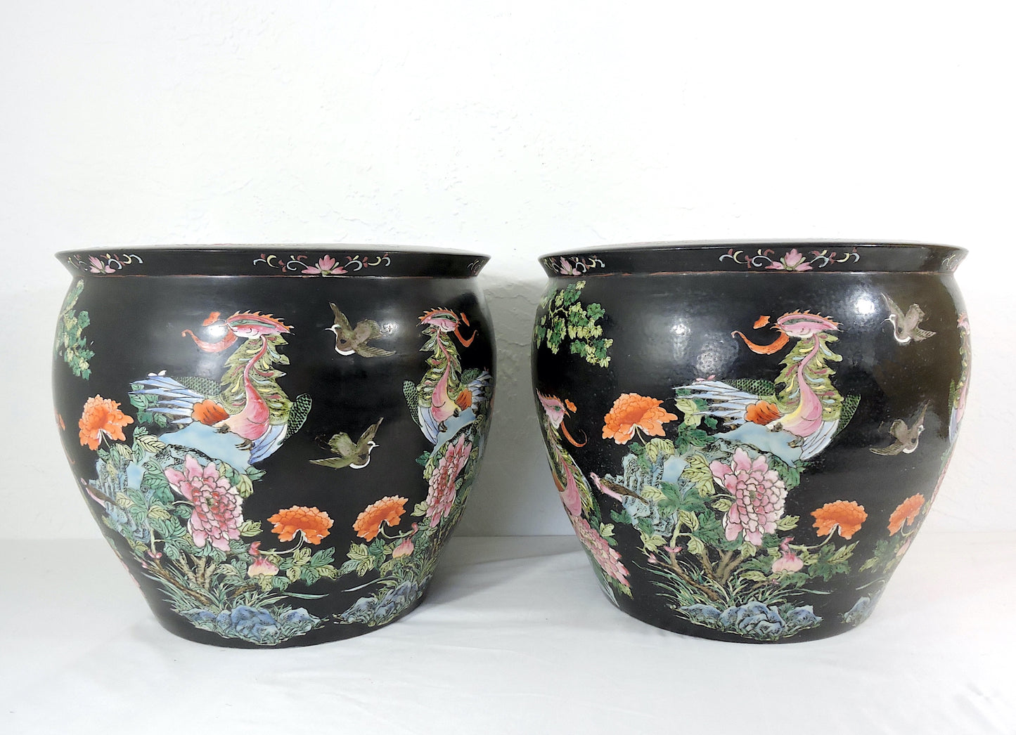 Early 20th Century Family Noire Black Chinese Porcelain Planters With Goldfish & Phoenix Birds - a Pair, on Rosewood Stands