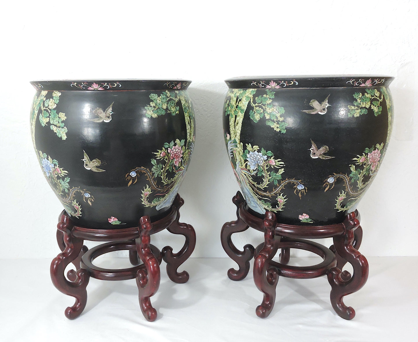 Early 20th Century Family Noire Black Chinese Porcelain Planters With Goldfish & Phoenix Birds - a Pair, on Rosewood Stands