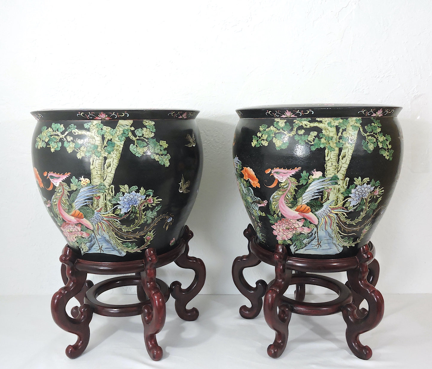 Early 20th Century Family Noire Black Chinese Porcelain Planters With Goldfish & Phoenix Birds - a Pair, on Rosewood Stands