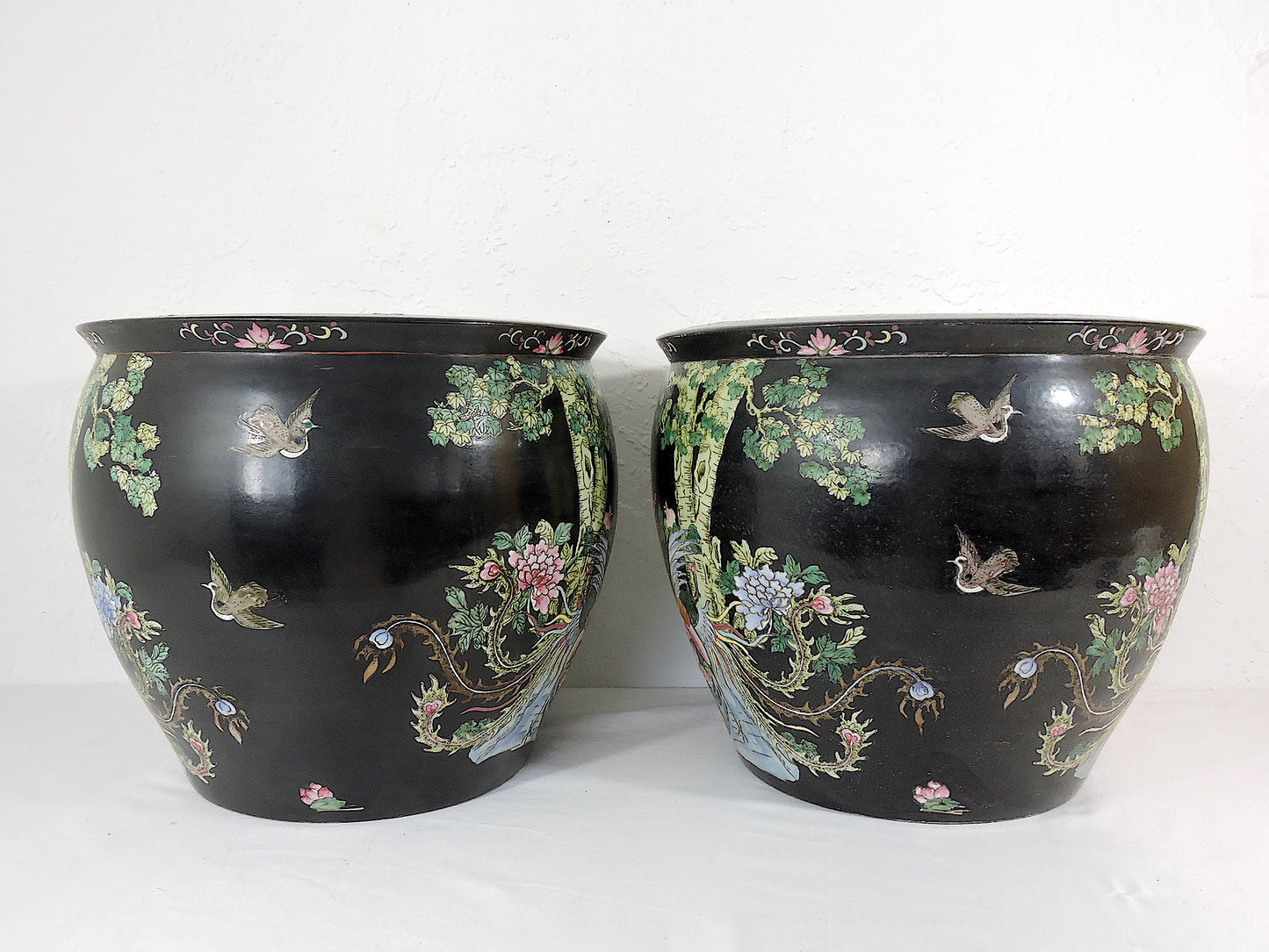 Early 20th Century Family Noire Black Chinese Porcelain Planters With Goldfish & Phoenix Birds - a Pair, on Rosewood Stands