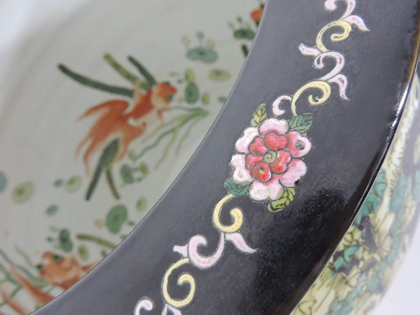 Early 20th Century Family Noire Black Chinese Porcelain Planters With Goldfish & Phoenix Birds - a Pair, on Rosewood Stands