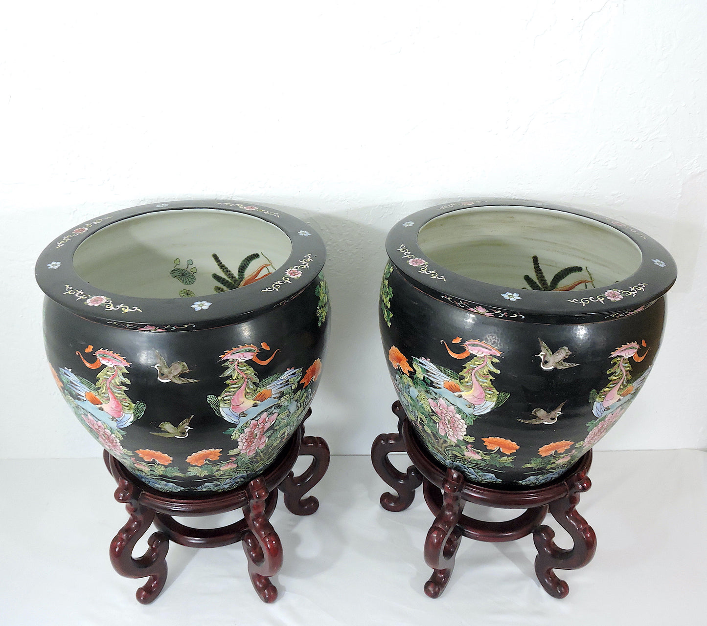 Early 20th Century Family Noire Black Chinese Porcelain Planters With Goldfish & Phoenix Birds - a Pair, on Rosewood Stands