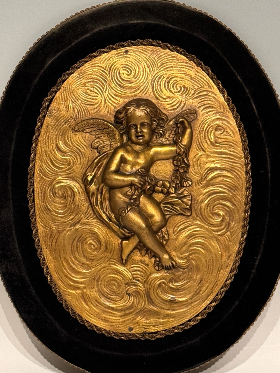 Antique French Gilt Bronze Oval Plaques of Winged Cherubs or Putti in High Relief, an Opposing Pair