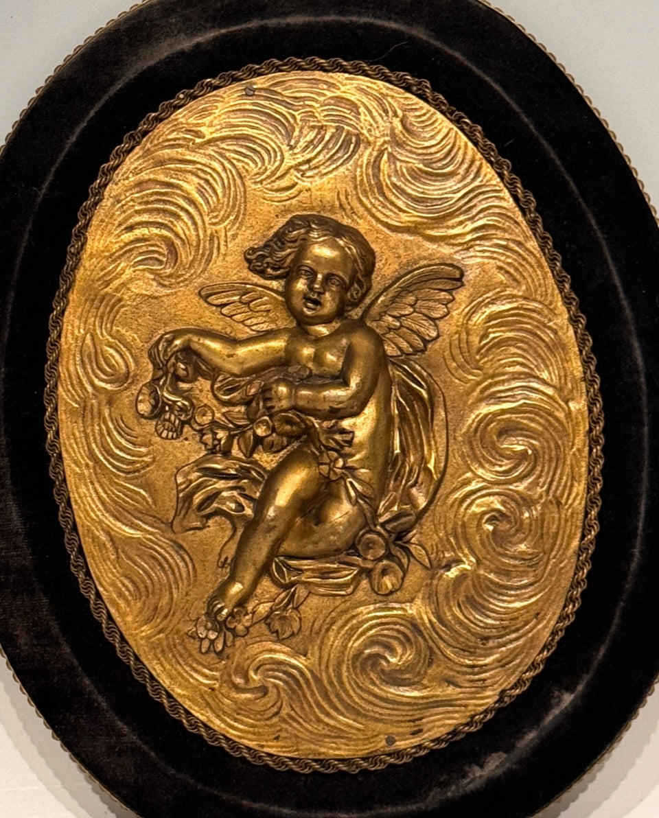 Antique French Gilt Bronze Oval Plaques of Winged Cherubs or Putti in High Relief, an Opposing Pair