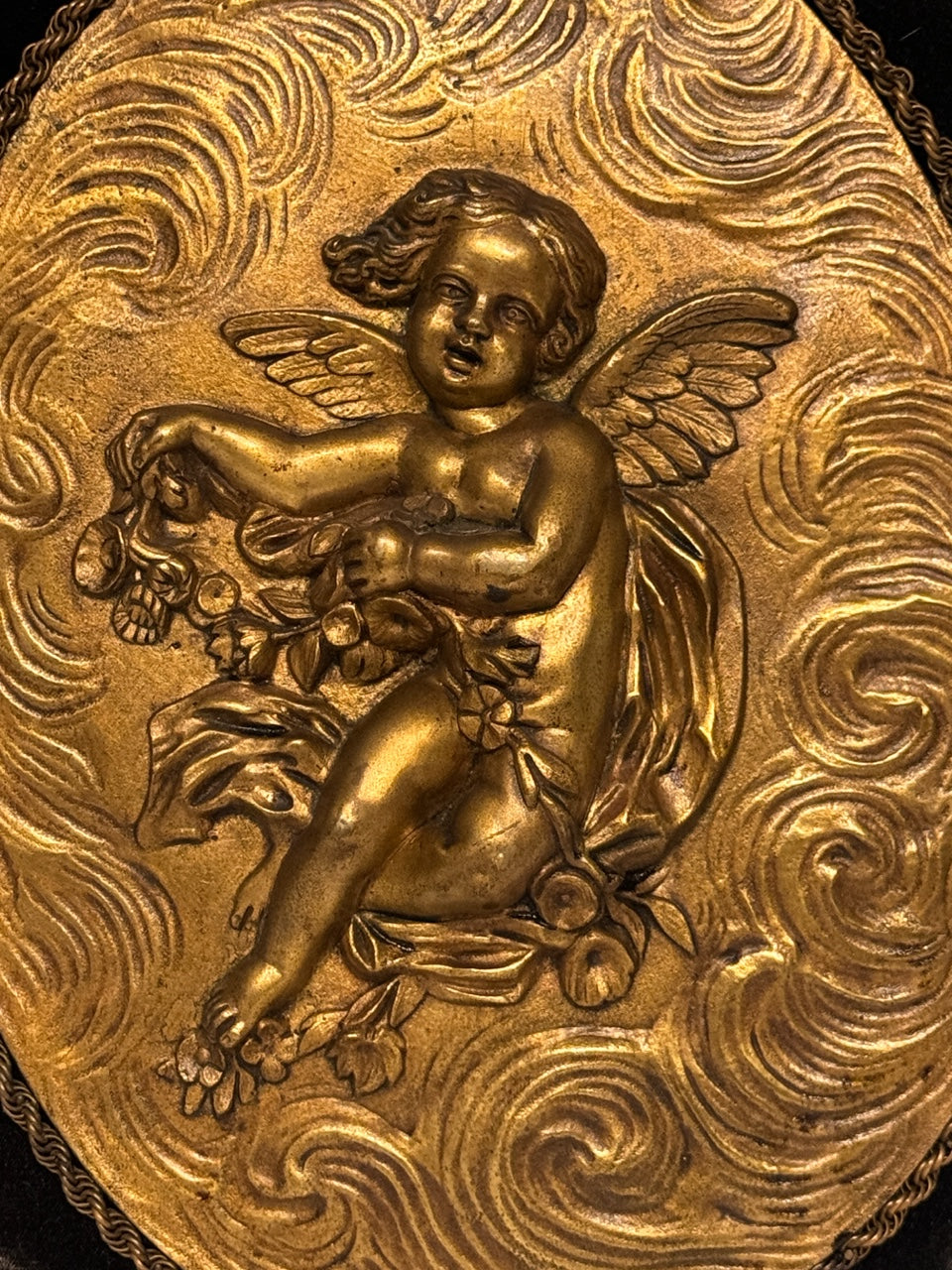 Antique French Gilt Bronze Oval Plaques of Winged Cherubs or Putti in High Relief, an Opposing Pair