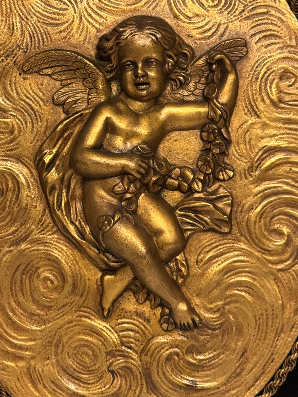 Antique French Gilt Bronze Oval Plaques of Winged Cherubs or Putti in High Relief, an Opposing Pair