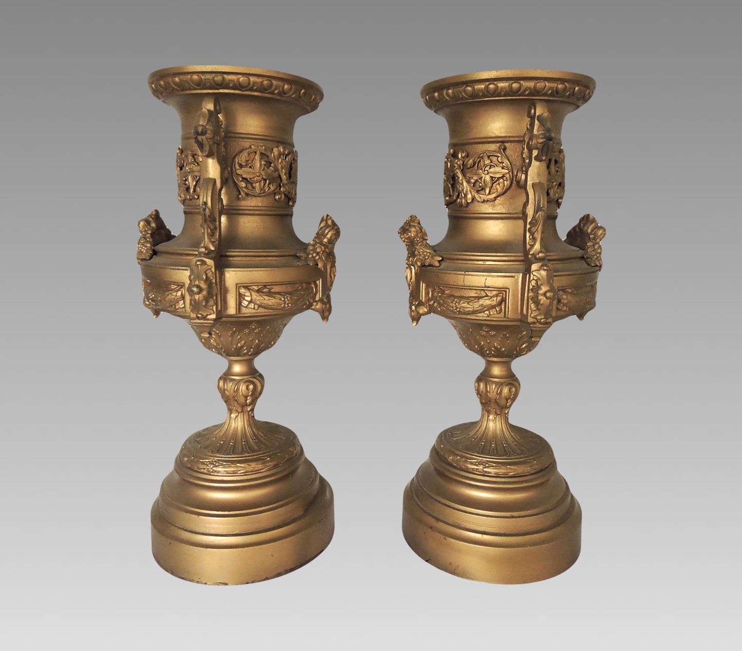 20th. Century Italian Neoclassical Spelter Ornamental Old Gold Urns or Planters - a Pair