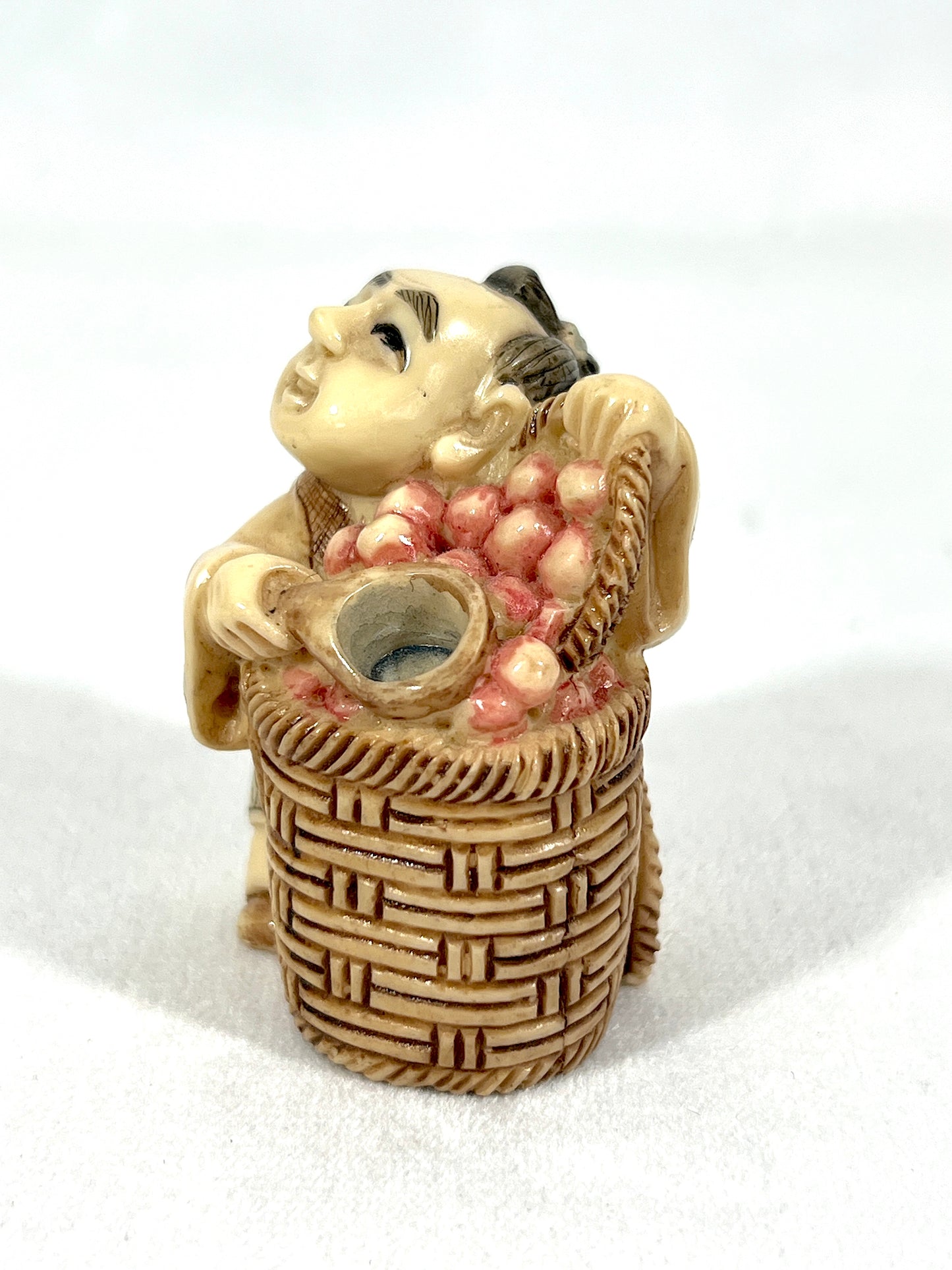 Vintage Chinese Netsuke - the Peach Seller and the Golden Ingot Bearer, a Pair, Brown Wood Stand