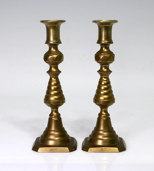 Great antique brass push up candlestick
