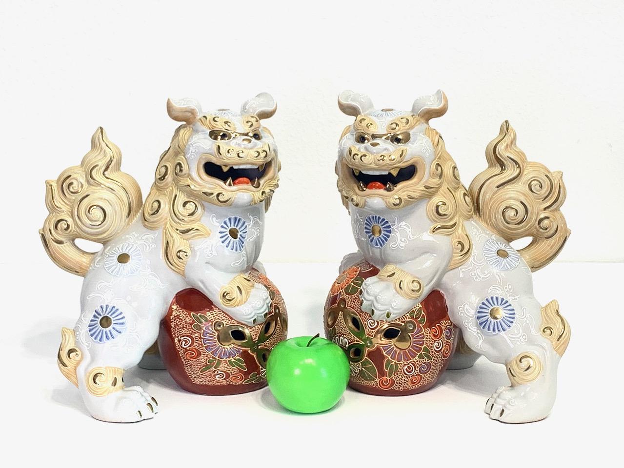 Japanese White & Gilt Porcelain Satsuma Male Foo Lions (Shishi Fu Dogs) - a Pair