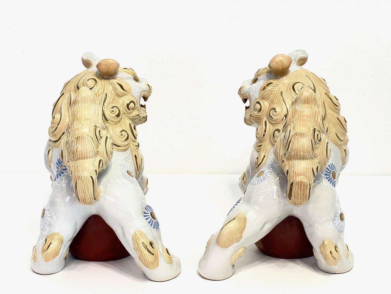 Japanese White & Gilt Porcelain Satsuma Male Foo Lions (Shishi Fu Dogs) - a Pair