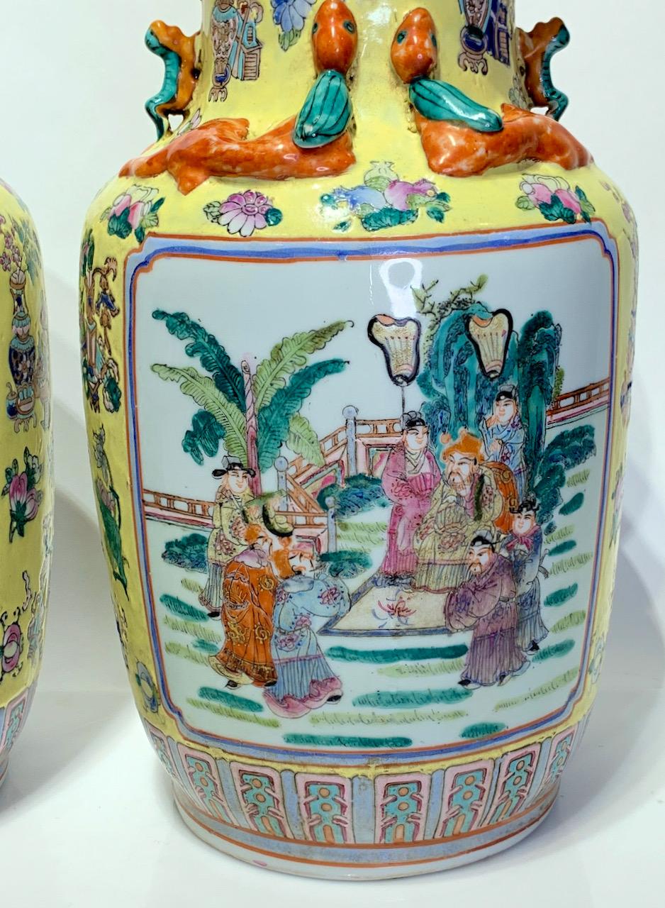 Vintage Chinese Porcelain Famille Jaune Vases With Foo Dogs & Chimera, a Pair